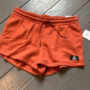 Burnt oranges sweat pant Reebok shorts